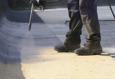 Coating systems over Salem spray foam roof systems